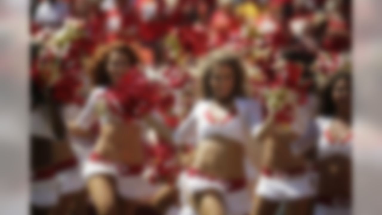 Kansas City Chiefs cheerleaders entertain the crowd in the first half of an NFL football game against the Tennessee Titans in Kansas City, Mo., Sunday, Sept. 7, 2014. (AP Photo/Charlie Riedel)