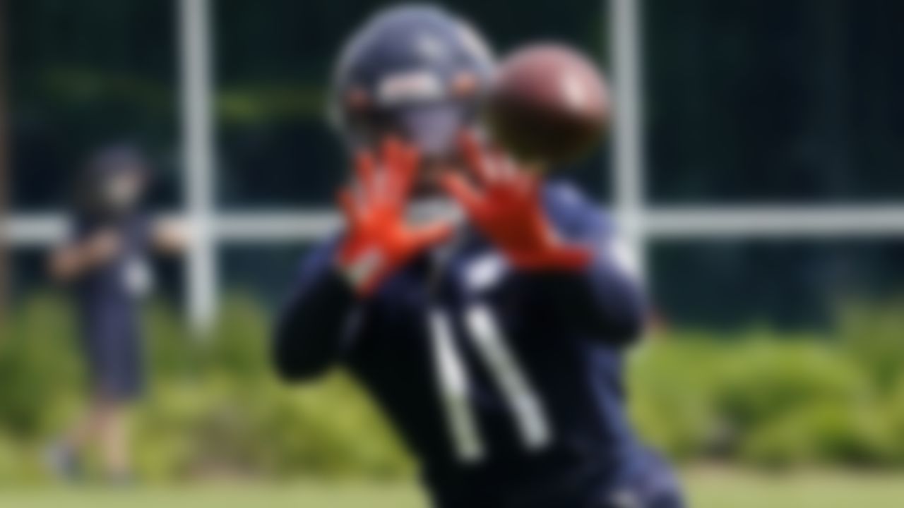 Chicago Bears wide receiver Darnell Mooney catches a ball during NFL football practice in Lake Forest, Ill., Wednesday, June 2, 2021.