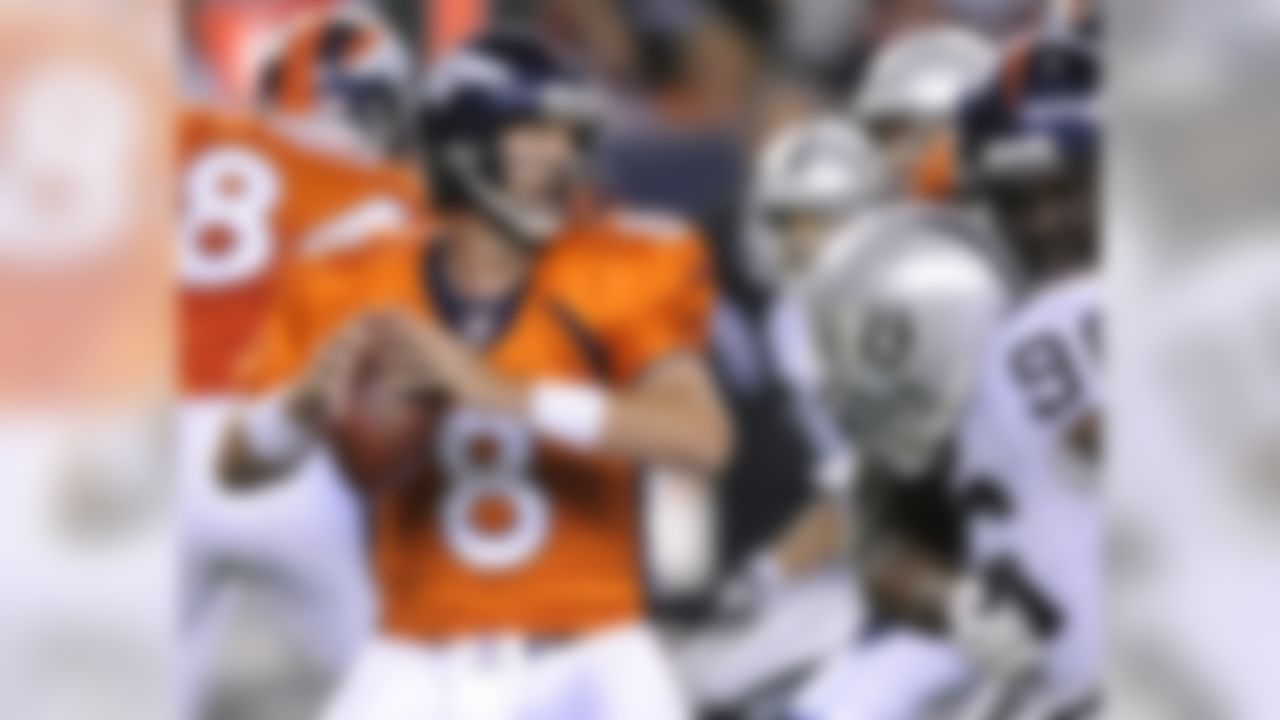 Denver Broncos quarterback Kyle Orton (8) steps back to pass against the Oakland Raiders during the first quarter of an NFL football game, Monday, Sept. 12, 2011, in Denver. (AP Photo/Jack Dempsey)