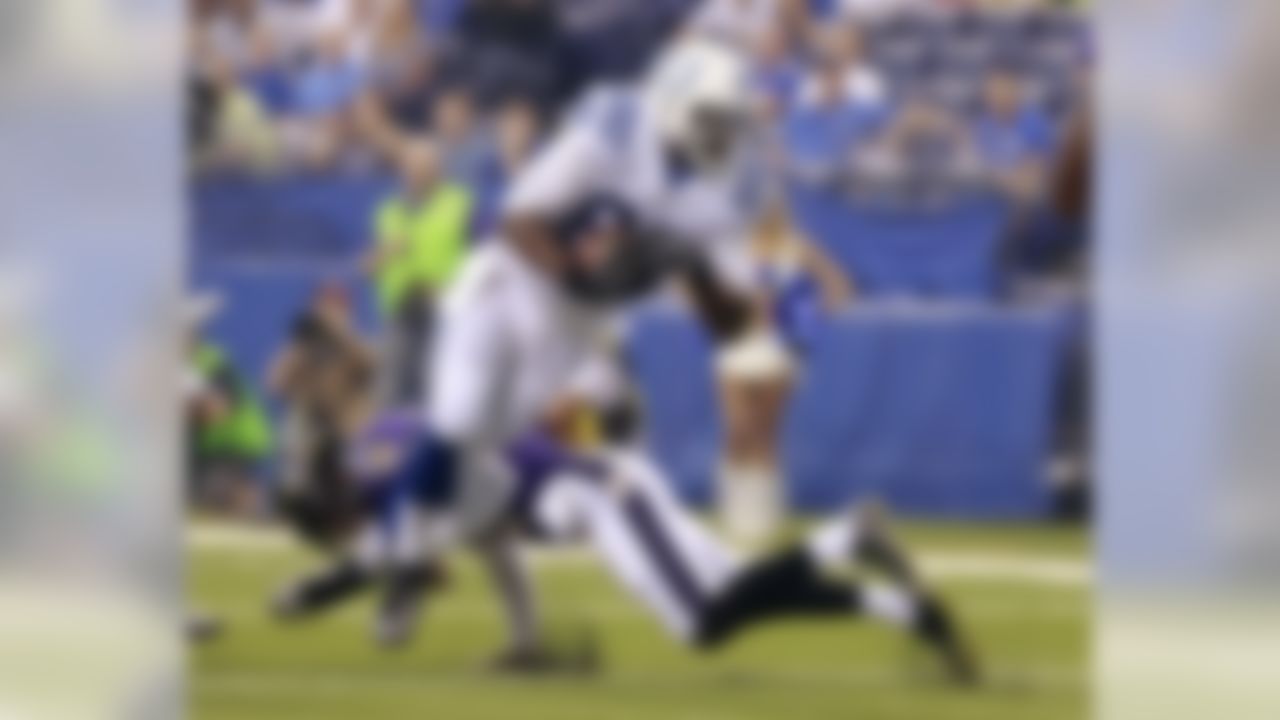 Baltimore Ravens defensive back Eric Weddle (32) trips up Indianapolis Colts tight end Dwayne Allen (83) during the first half of an NFL preseason football game in Indianapolis, Saturday, Aug. 20, 2016. (AP Photo/R Brent Smith)