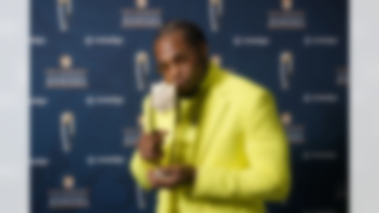 Tennessee Titians running back Derrick Henry poses with his Offensive Player of the Year award during the NFL Honors ceremony as part of Super Bowl 55 Friday, Feb. 5, 2021, in Tampa, Fla.