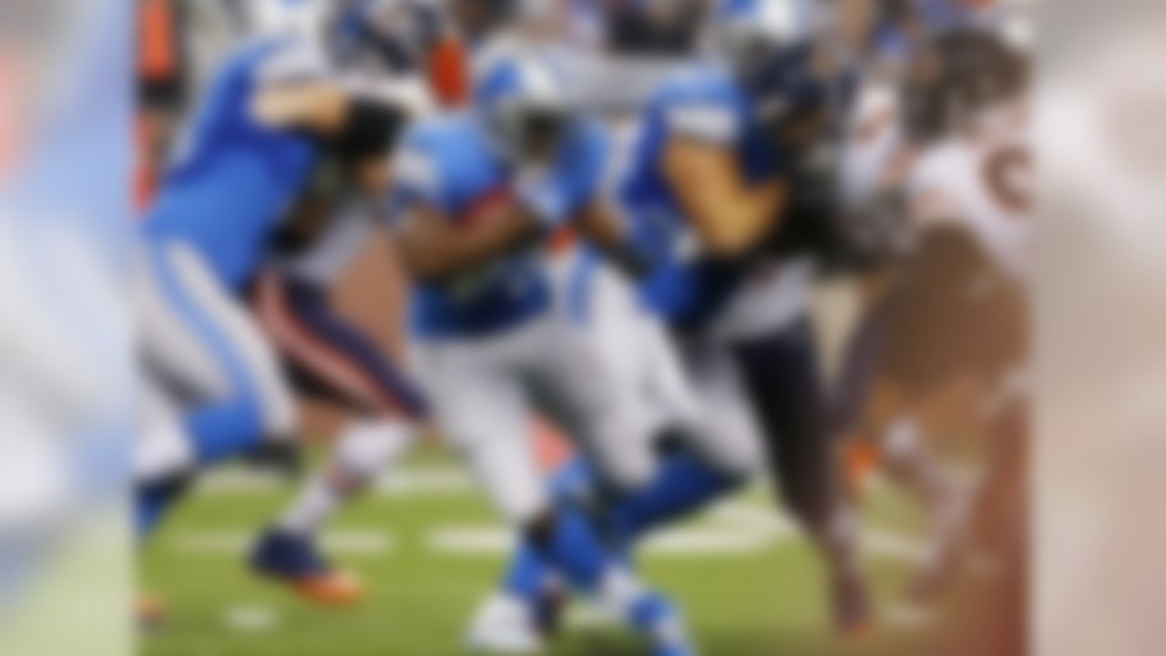 Detroit Lions running back Reggie Bush (21) runs during the first quarter of an NFL football game against the Chicago Bears at Ford Field in Detroit, Sunday, Sept. 29, 2013. (AP Photo/Paul Sancya)