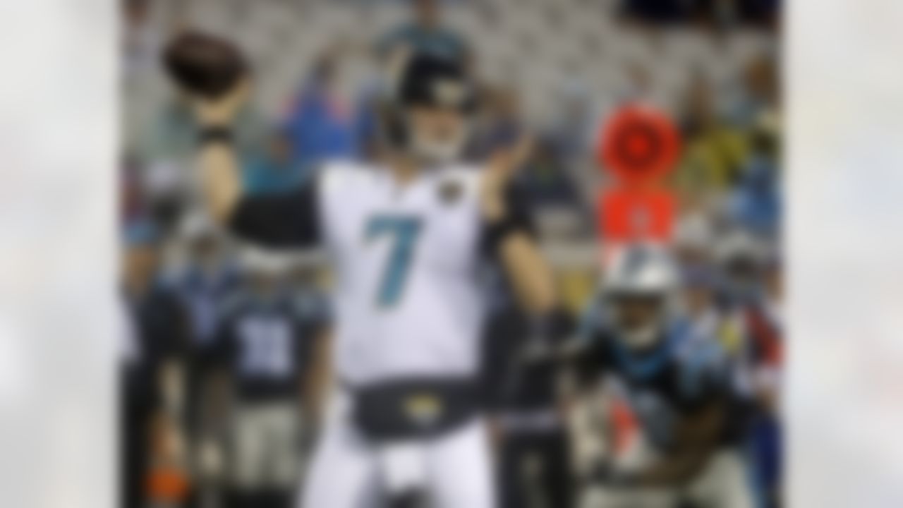 Jacksonville Jaguars quarterback Chad Henne (7) throws a pass as he is pressured by Carolina Panthers safety Mike Adams (29) during the first half of an NFL preseason football game, Thursday, Aug. 24, 2017, in Jacksonville, Fla. (AP Photo/Stephen B. Morton)