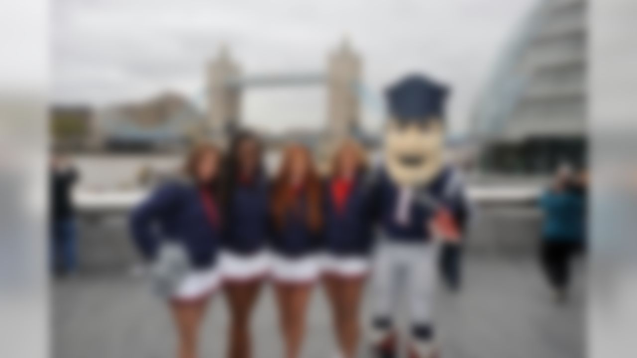 New England Patriots cheerleaders and mascot pose for a photo in London, England on October 26, 2012. (Keith Nordstrom/NFL)