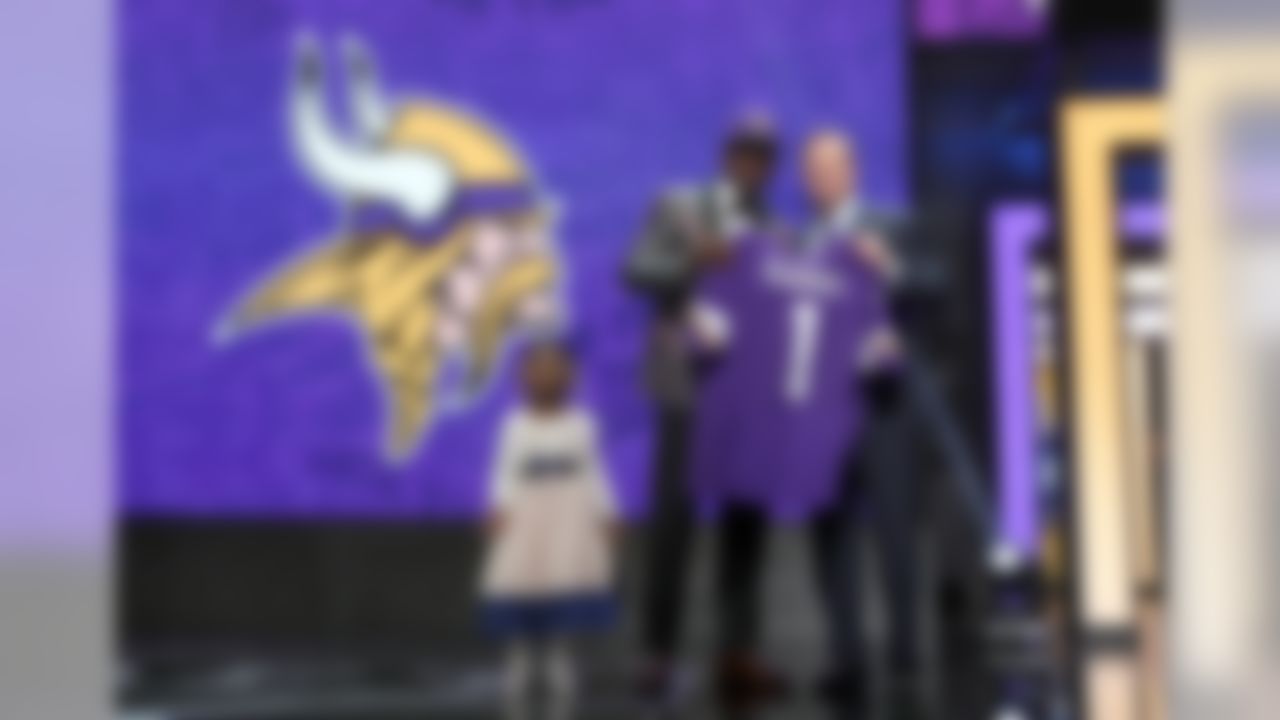 Mississippi wide receiver Laquon Treadwell poses on stage with his daughter and NFL Commissioner Roger Goodell during the 2016 NFL Draft at the Auditorium Theatre on Thursday, April 28, 2016 in Chicago. (Perry Knotts/NFL)