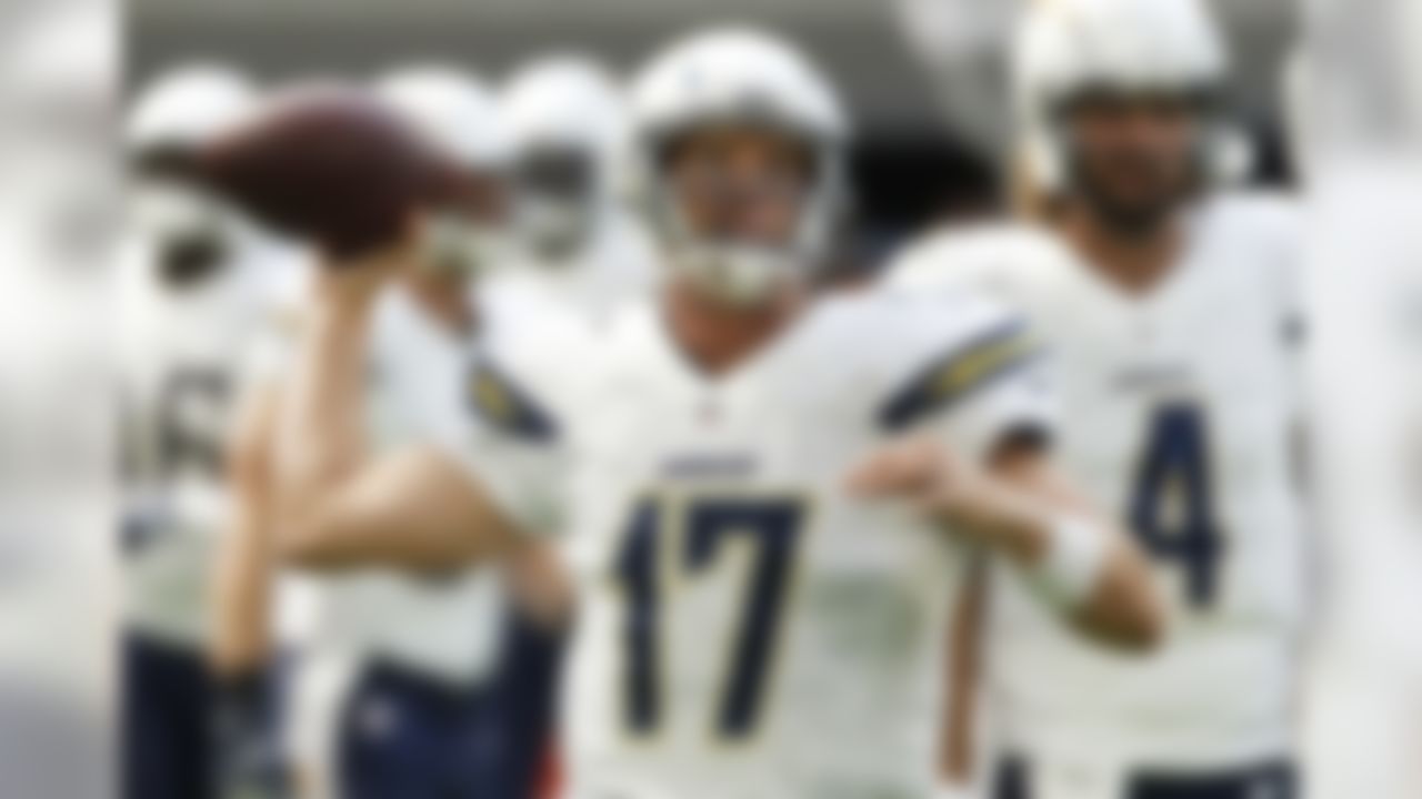 San Diego Chargers quarterback Philip Rivers (17) warms up before an NFL preseason football game against the Minnesota Vikings Sunday, Aug. 28, 2016, in Minneapolis. (AP Photo/Jim Mone)