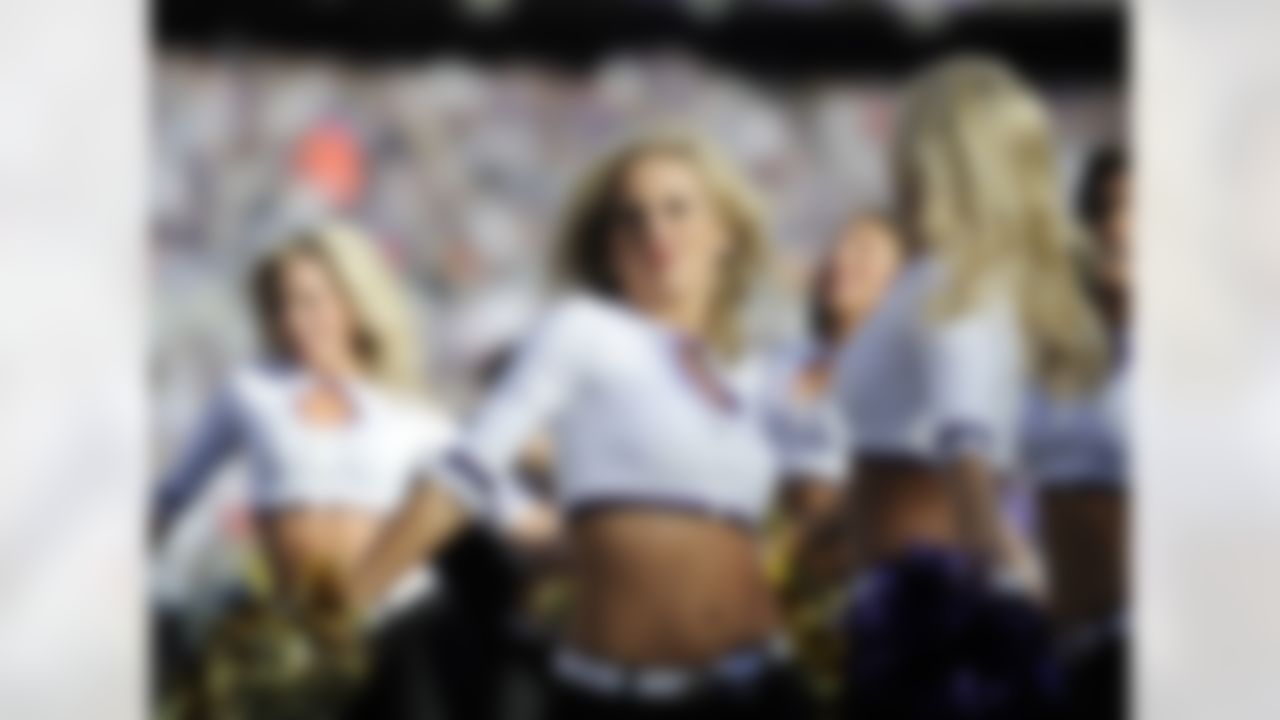 Baltimore Ravens cheerleaders perform during the first half of an NFL wild card playoff football game against the Baltimore Ravens, Sunday, Jan. 6, 2013, in Baltimore. (AP Photo/Nick Wass)