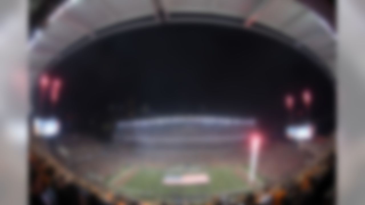 General view of fireworks and a United States flag on the field during the playing of the national anthem before the NFL game between the Cleveland Browns and Cincinnati Bengals at Paul Brown Stadium on Thursday, November 5, 2015 in Cincinnati, Ohio. (Kirby Lee/NFL)