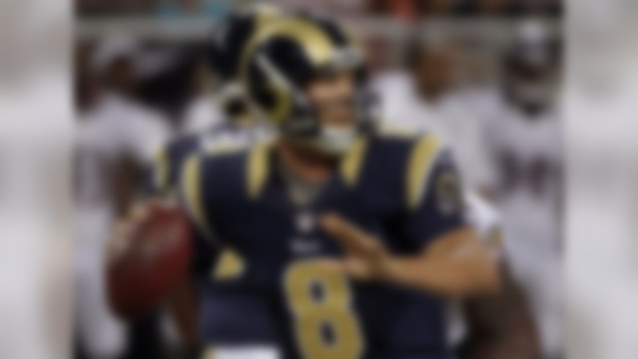 St. Louis Rams quarterback Sam Bradford throws during the first quarter of a preseason NFL football game against the Baltimore Ravens Thursday, Aug. 30, 2012, in St. Louis. (AP Photo/Seth Perlman)