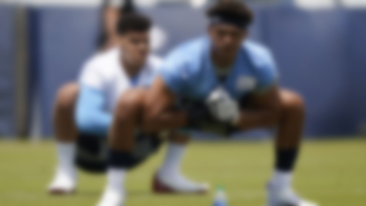 Tennessee Titans linebacker Rashad Weaver stretches during NFL football rookie minicamp Saturday, May 15, 2021, in Nashville, Tenn.
