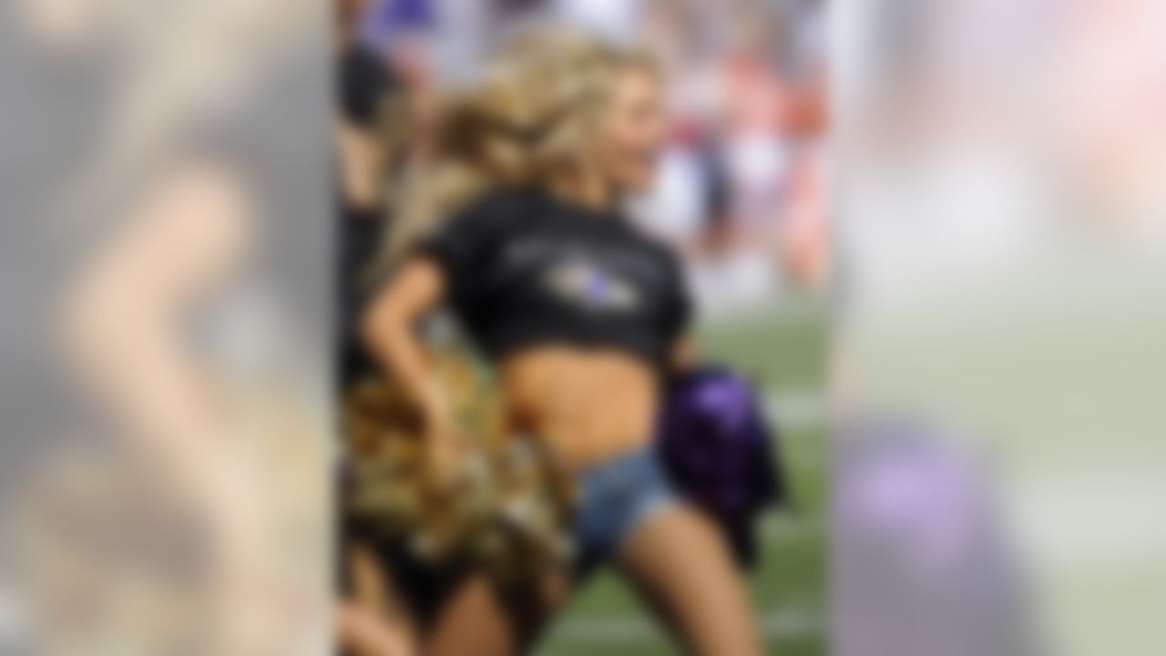 A Baltimore Ravens cheerleader performs during the NFL football game between the Baltimore Ravens and the Kansas City Chiefs, Sunday, Sept. 13, 2009 in Baltimore. (AP Photo/Nick Wass)