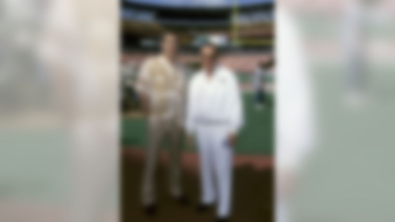 NFL Commissioner Paul Tagliabue poses with Al Davis, a member of the Pro Football Hall of Fame Class of 1992 on the field before the NFC's 21-15 victory over the AFC in the 1992 NFL Pro Bowl played on February 2, 1992 at Aloha Stadium in Honolulu, Hawaii. (National Football League)