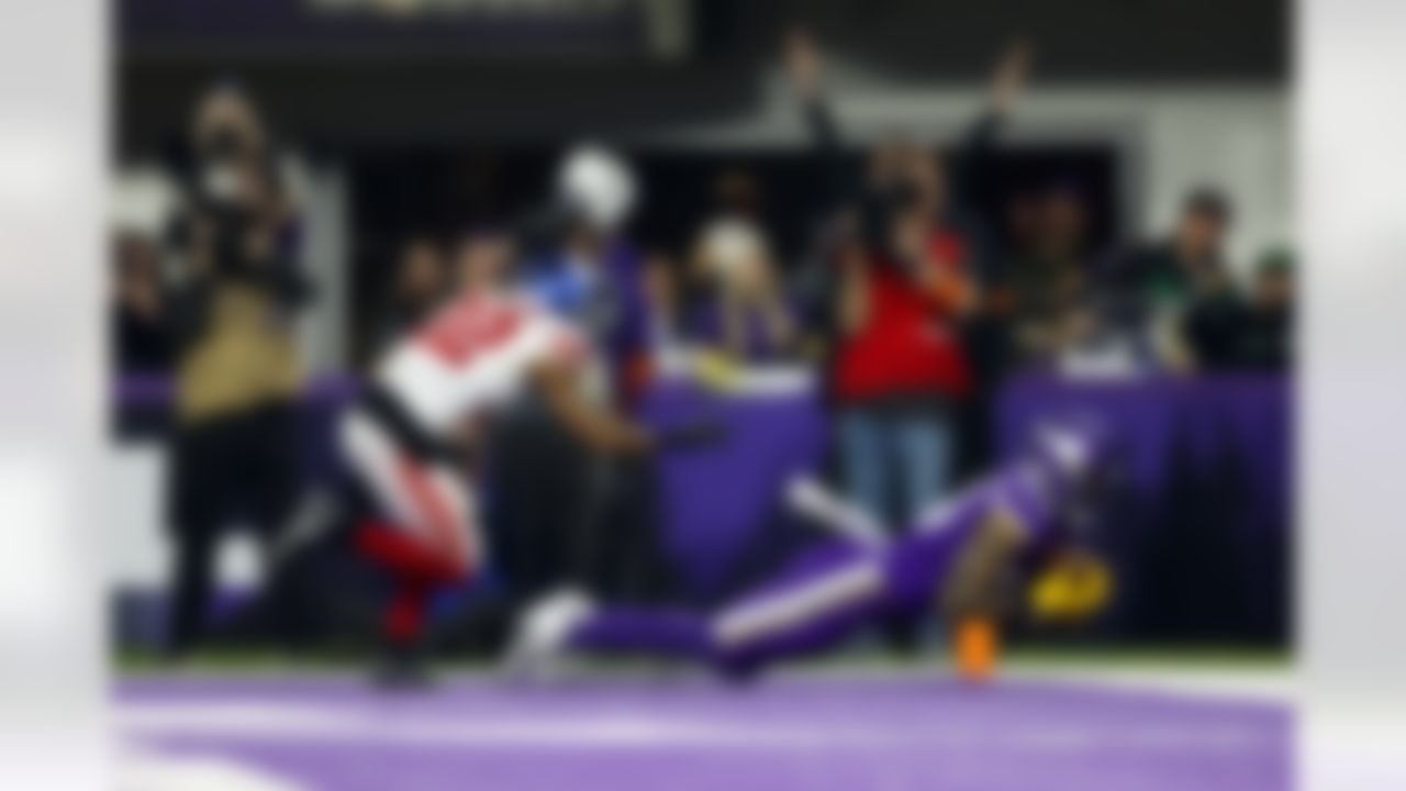 Minnesota Vikings tight end Irv Smith Jr. (84) makes a catch for a touchdown during an NFL Super Wild Card Weekend playoff game against the New York Giants on Sunday, January 15, 2023 in Minneapolis, Minnesota.