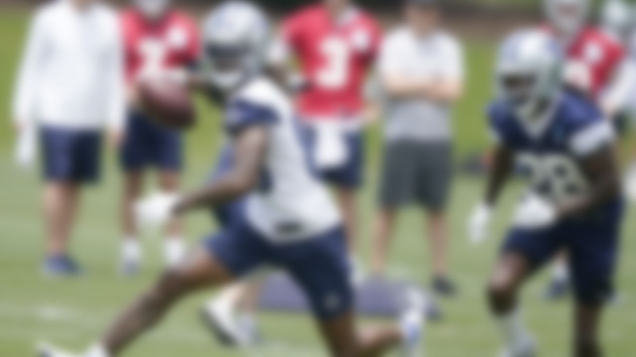 Dallas Cowboys wide receiver CeeDee Lamb, left, runs after catching a pass against Dallas Cowboys cornerback Maurice Canady, right, during an NFL football team practice Tuesday, June 8, 2021, in Frisco, Texas.