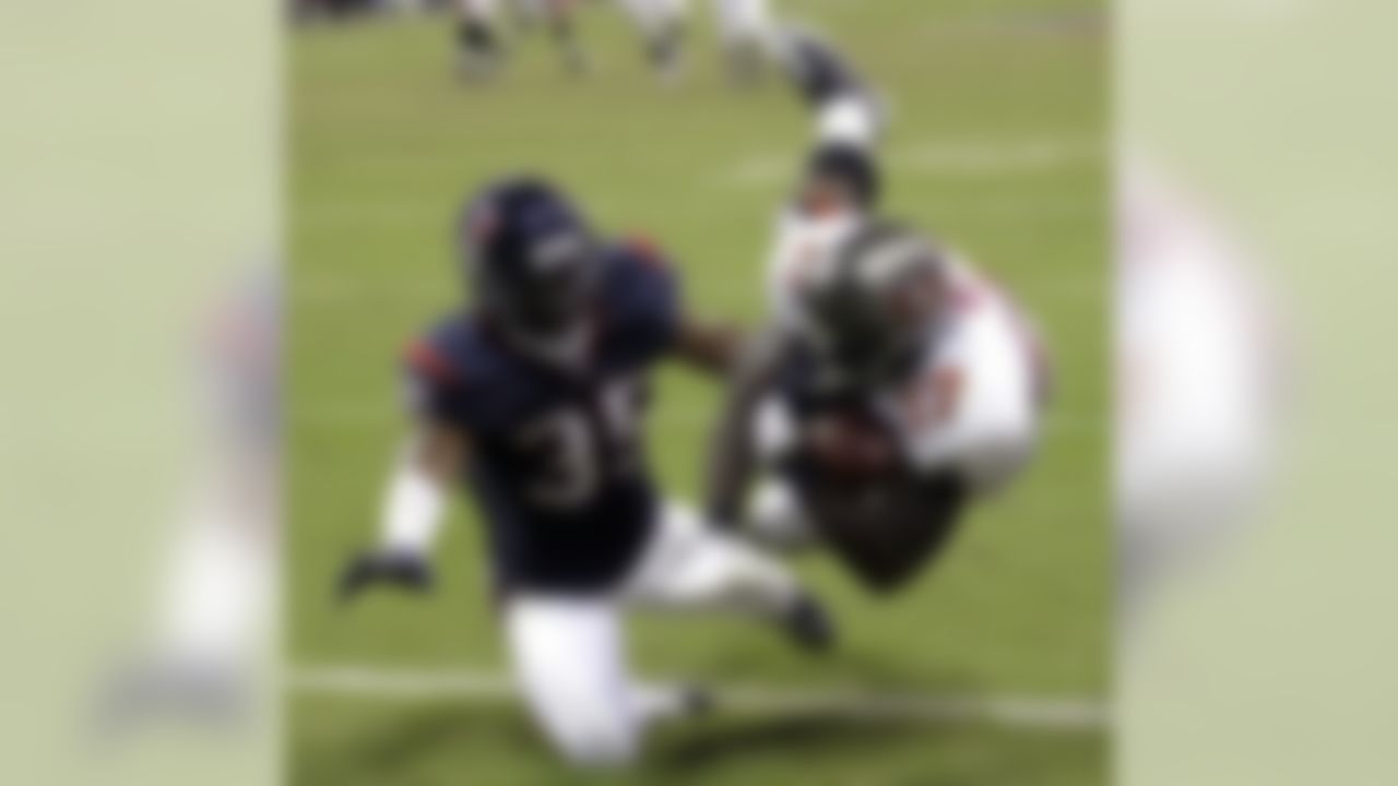 Tampa Bay Buccaneers wide receiver Arrelious Benn (17) makes a touchdown catch as Houston Texans cornerback Jacques Reeves (35) defends during the fourth quarter of an NFL preseason football game Thursday, Sept. 2, 2010, in Houston. (AP Photo/David J. Phillip)