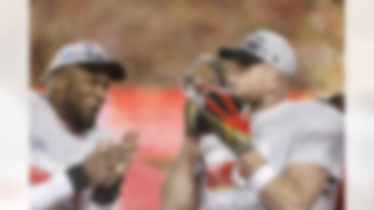 Kansas City Chiefs tight end Travis Kelce (87) celebrates with the Lamar Hunt Trophy after an NFL Conference Championship playoff game against the Cincinnati Bengals on Sunday, January 29, 2023 in Kansas City, Missouri.