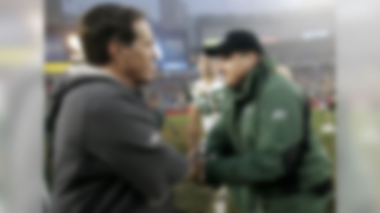 Mangini accuses the Patriots of using a camera on the sidelines to tape defensive signals. Belichick was fined $500K and the Patriots had to pay $250K. The Patriots also had to forfeit draft picks, too. And let's just say handshakes between the teacher and former pupil were a little awkward after that. (AP Photo/Winslow Townson)