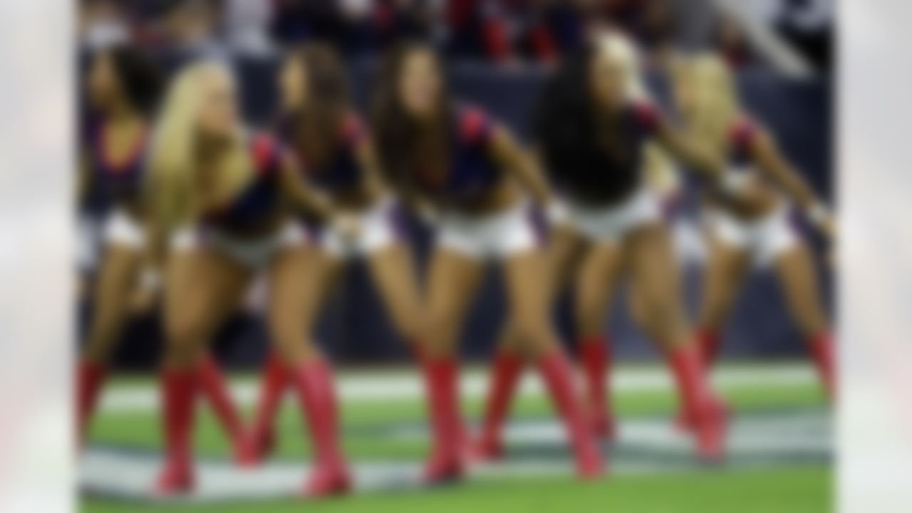 Houston Texans cheerleaders perform during the first half of an NFL football game against the Jacksonville Jaguars Sunday, Dec. 28, 2014, in Houston. (AP Photo/Patric Schneider)