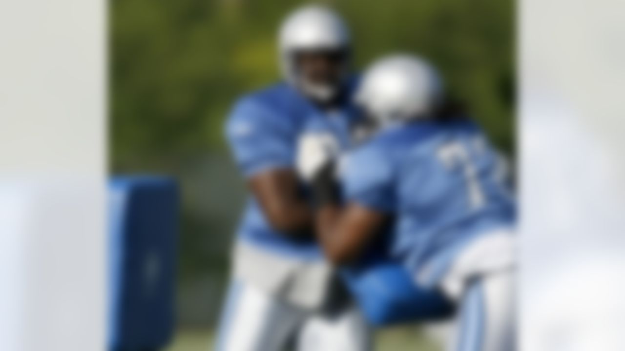 ALLEN PARK, MI - JULY 24: Gosder Cherilus #77 of the Detroit Lions does a blocking drill with George Foster #72 during training camp at the Detroit Lions Headquarters and Training Facility on July 24, 2008 in Allen Park, Michigan. (Photo by Gregory Shamus/Getty Images)