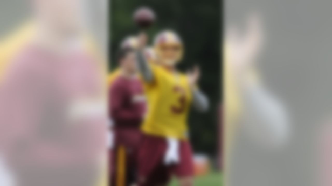 Washington Redskins quarterback John Beck (3) throws a pass during practice at the NFL football team's training camp, Sunday, Aug. 15, 2010, at Redskins Park in Ashburn, Va. (AP Photo/Nick Wass)