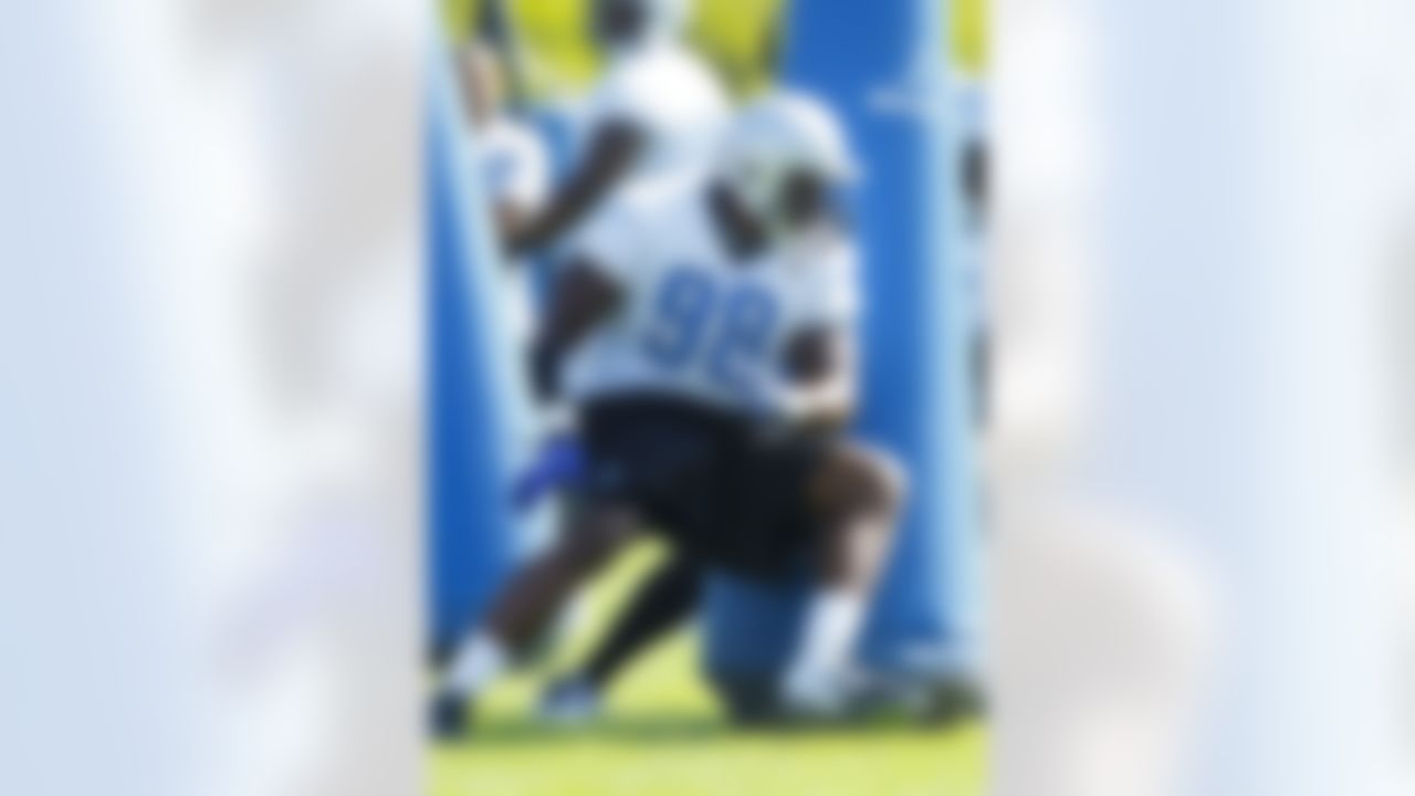 Detroit Lions defensive tackle Nick Fairley (98) runs drills during NFL football training camp at the team's practice facility in Allen Park, Mich., Saturday, July 30, 2011. (AP Photo/Rick Osentoski)