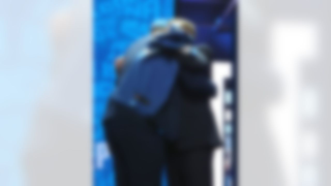 Ohio State offensive tackle Taylor Decker embraces NFL Commissioner Roger Goodell after being drafted by the Detroit Lions during the 2016 NFL Draft at the Auditorium Theatre on Thursday, April 28, 2016 in Chicago. (Perry Knotts/NFL)