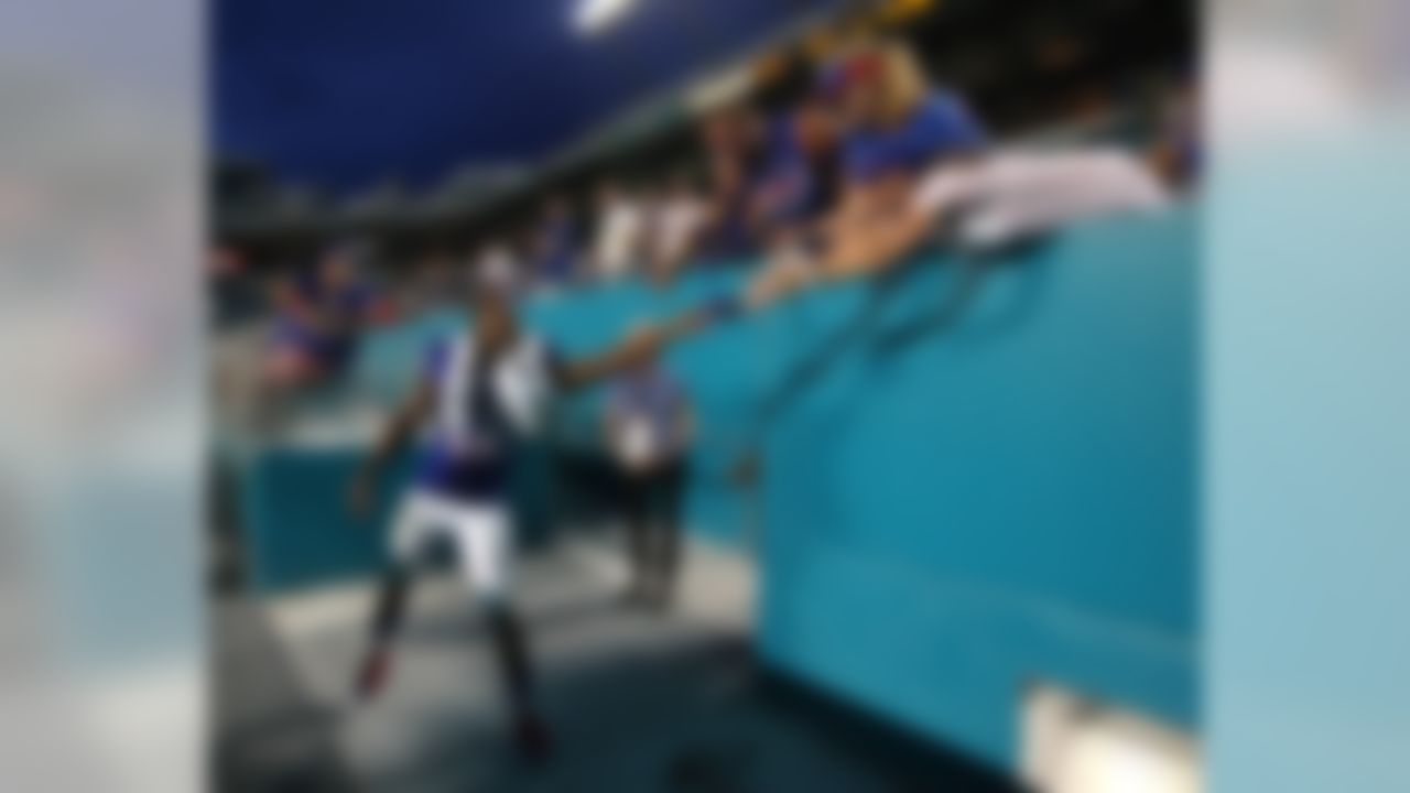 Buffalo Bills wide receiver Percy Harvin (18) gives his gloves to fans during an NFL football game against the Miami Dolphins at Sun Life Stadium on Sunday, September 27, 2015 in Miami Gardens, FL. The Bills defeated the Dolphins 41-14. (Perry Knotts/NFL)