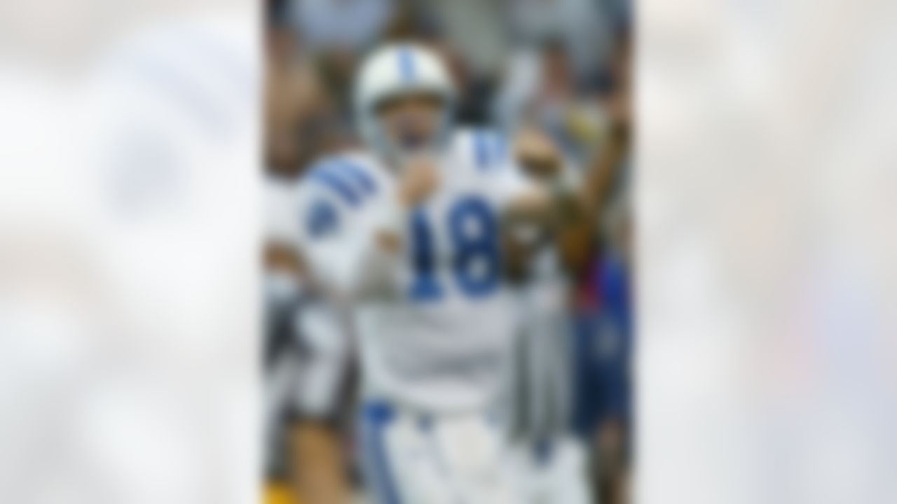 ORCHARD PARK, NY - NOVEMBER 23: Peyton Manning #18 of the Indianapolis Colts celebrates the Colts winning touchdown against the Buffalo Bills on November 23, 2003 at Ralph Wilson Stadium in Orchard Park, New York. The Colts won 17-14. (Photo by Rick Stewart/Getty Images)