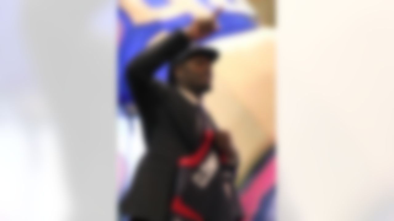 Jadeveon Clowney poses on stage after being selected by the Houston Texans during the 2014 NFL Draft at Radio City Music Hall on May 8, 2014 in New York, NY. (Perry Knotts/NFL)