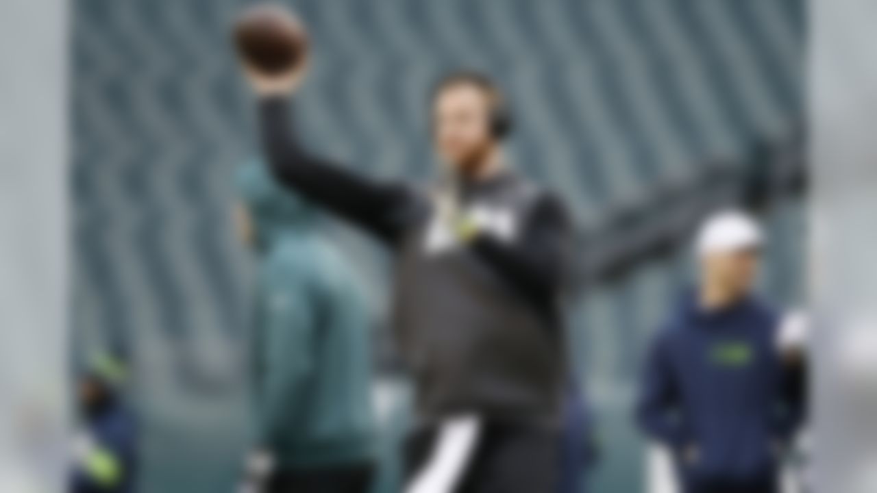 Philadelphia Eagles' Carson Wentz warms up before an NFL football game against the Seattle Seahawks, Sunday, Nov. 24, 2019, in Philadelphia. (AP Photo/Michael Perez)