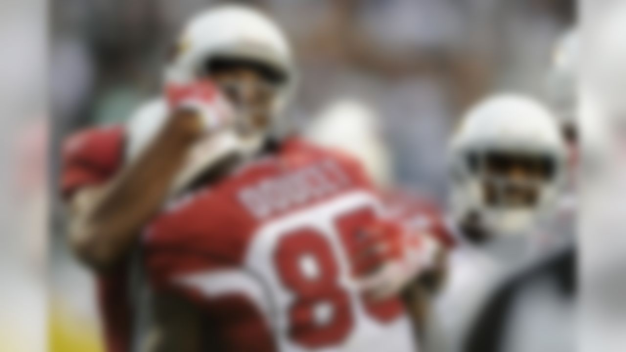 From left to right, Arizona Cardinals' Larry Fitzgerald, Early Doucet and Chansi Stuckey celebrate after Doucet's touchdown in the second half of an NFL football game against the Philadelphia Eagles, Sunday, Nov. 13, 2011, in Philadelphia. (AP Photo/Michael Perez)