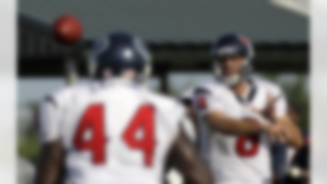Houston Texans quarterback Matt Schaub (8) throws a pass to fullback Vonta Leach (44) during a NFL football training camp practice Thursday, Aug. 5, 2010, in Houston. (AP Photo/David J. Phillip)
