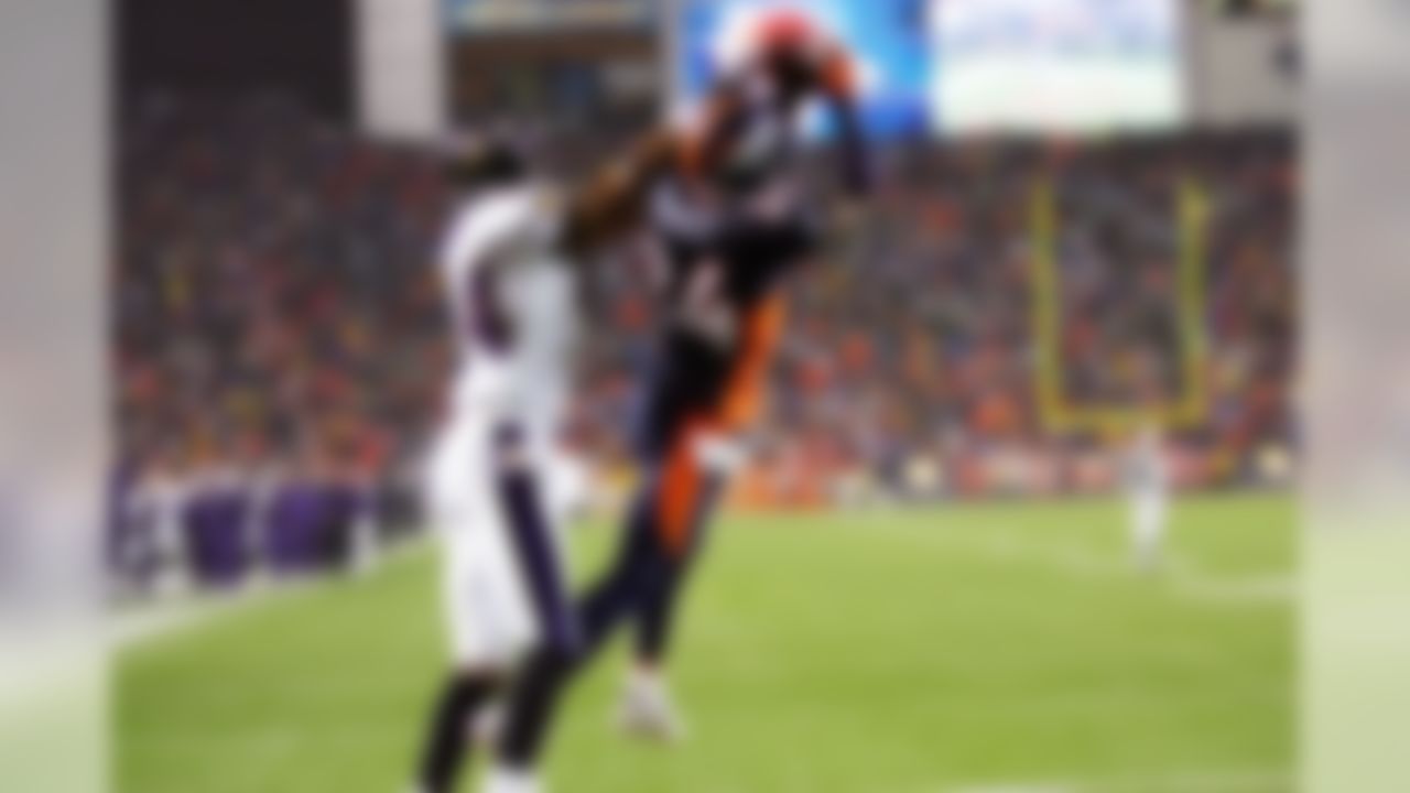 Photo: Ravens Todd Heap gains 4 yards against the Denver Broncos