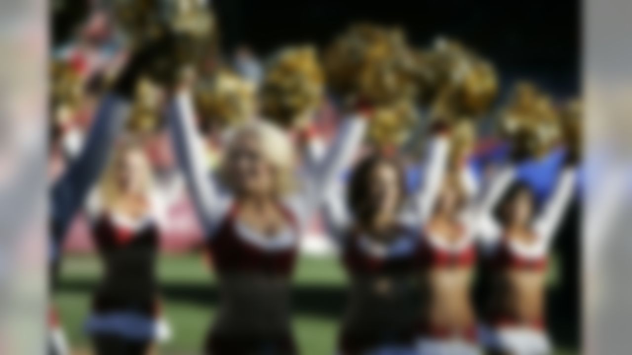 Cheerleaders perform during an NFL football game between the San Francisco 49ers and Jacksonville Jaguars in San Francisco, Sunday, Nov. 29, 2009. (AP Photo/Paul Sakuma)