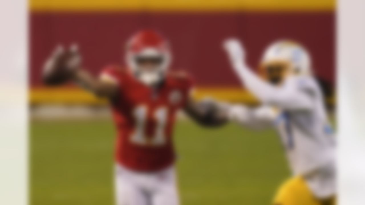 Los Angeles Chargers cornerback Tevaughn Campbell breaks up a pass intended for Kansas City Chiefs wide receiver Demarcus Robinson (11) during the second half of an NFL football game, Sunday, Jan. 3, 2021, in Kansas City.
