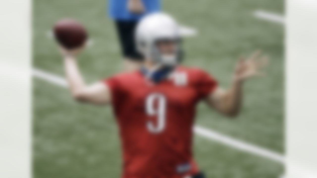 Detroit Lions quarterback Matthew Stafford throws during NFL football training camp at the team's indoor practice facility in Allen Park, Mich., Friday, July 29, 2011. (AP Photo/Paul Sancya)