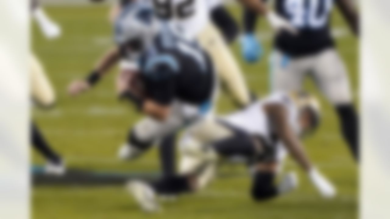 Carolina Panthers' Tommy Stevens is tackled by New Orleans Saints cornerback P.J. Williams during the second half of an NFL football game Sunday, Jan. 3, 2021, in Charlotte, N.C.