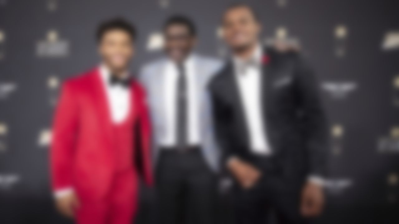 Arizona Cardinals quarterback Kyler Murray, Hall of Famer Micheal Irvin, and Houston Texans quarterback Deshaun Watson on the red carpet during the 9th Annual NFL Honors on Saturday, Feb. 1, 2020, in Miami.