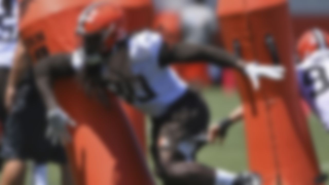 Cleveland Browns defensive linemen Jadeveon Clowney (90) participates in a drill during an NFL football practice at the team's training facility, Thursday, June 17, 2021, in Berea, Ohio.