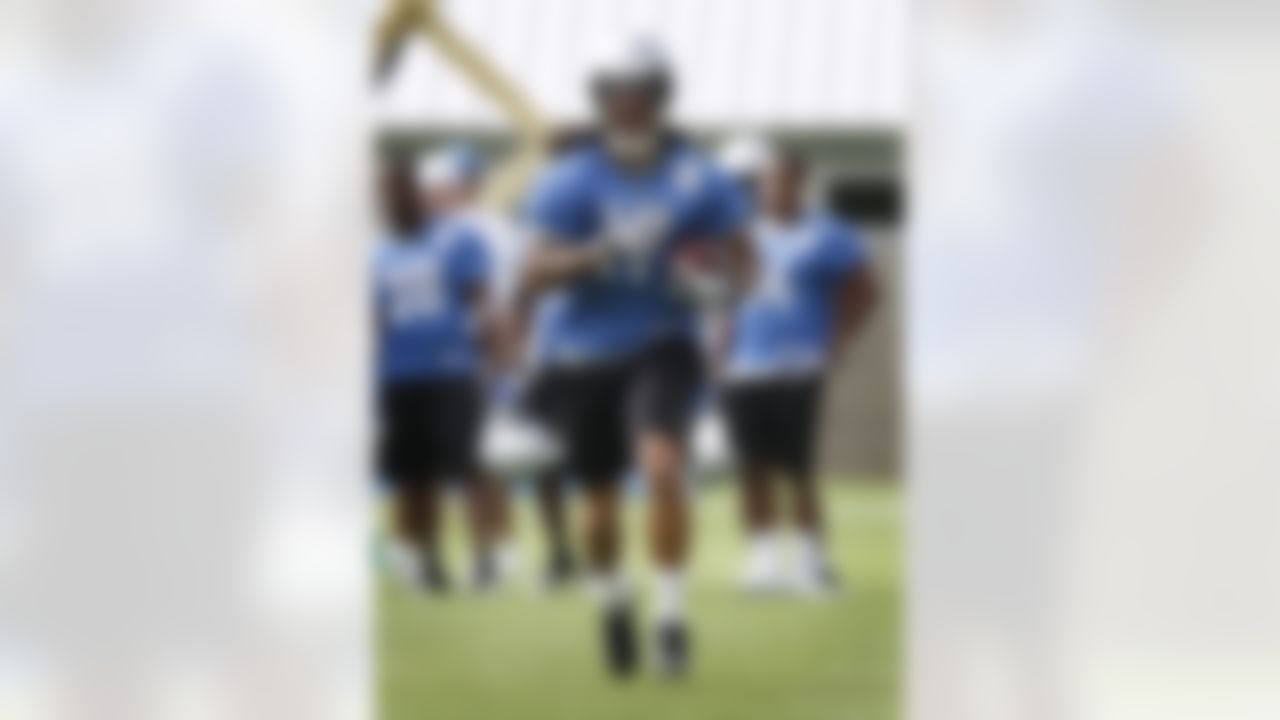 Detroit Lions receiver Mike Moore (17) practices during NFL football minicamp at the teams' training facility in Allen Park, Mich., Thursday, June 24, 2010. (AP Photo/Carlos Osorio)