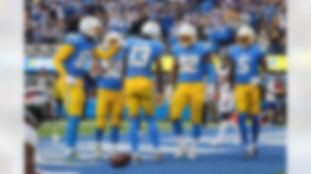 Los Angeles Chargers wide receiver Keenan Allen (13) celebrates a touchdown during an NFL football game against the Denver Broncos on Sunday, January 2, 2022 in Inglewood, California.
