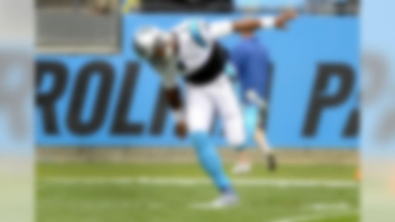 Carolina Panthers' Cam Newton (1) takes the field during warm ups before an NFL football game against the New Orleans Saints in Charlotte, N.C., Sunday, Sept. 27, 2015. (AP Photo/Mike McCarn)