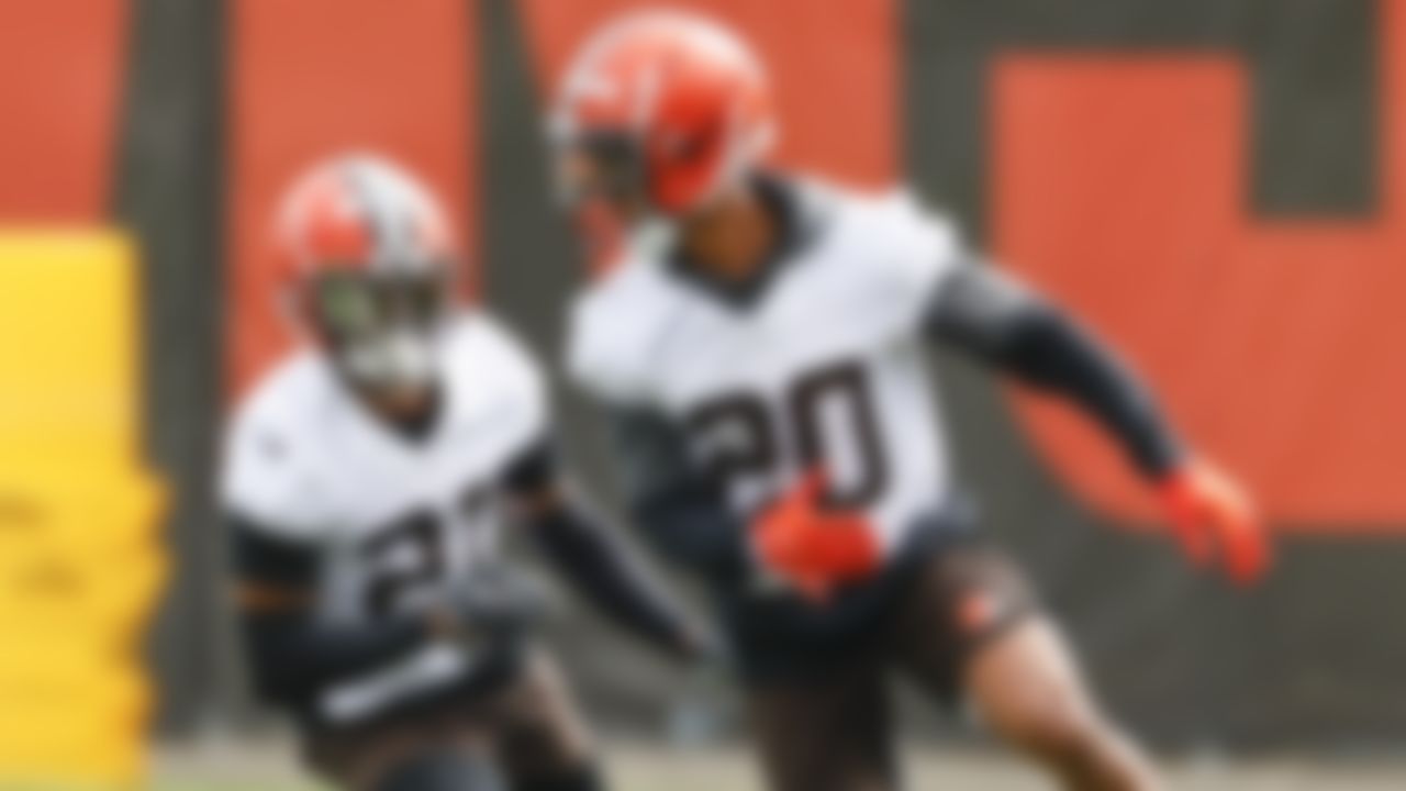 Cleveland Browns cornerback Denzel Ward (21) and Greg Newsome II (20) runs through a drill during an NFL football practice at the team's training facility Wednesday, June 9, 2021, in Berea, Ohio.