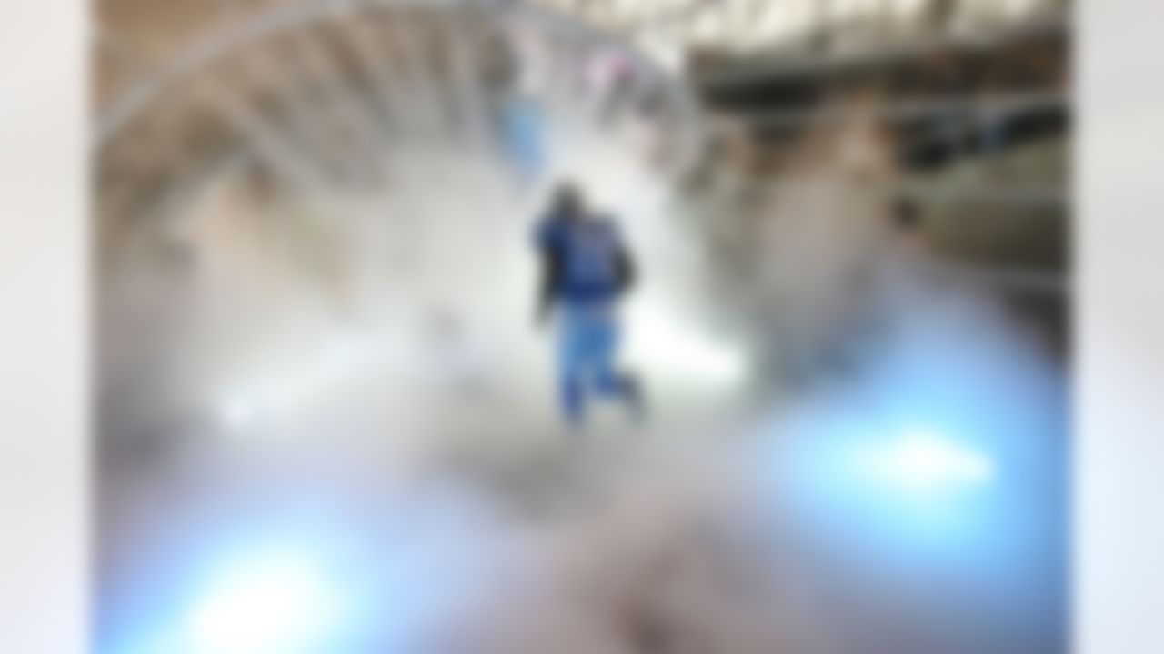 DETROIT - SEPTEMBER 30: Kenoy Kennedy #26 of the Detroit Lions runs onto the field during player introductions before a game against the Chicago Bears on September 30, 2007 at Ford Field in Detroit, Michigan. The Lions defeated the Bears 37-27. (Photo by Jonathan Daniel/Getty Images)
