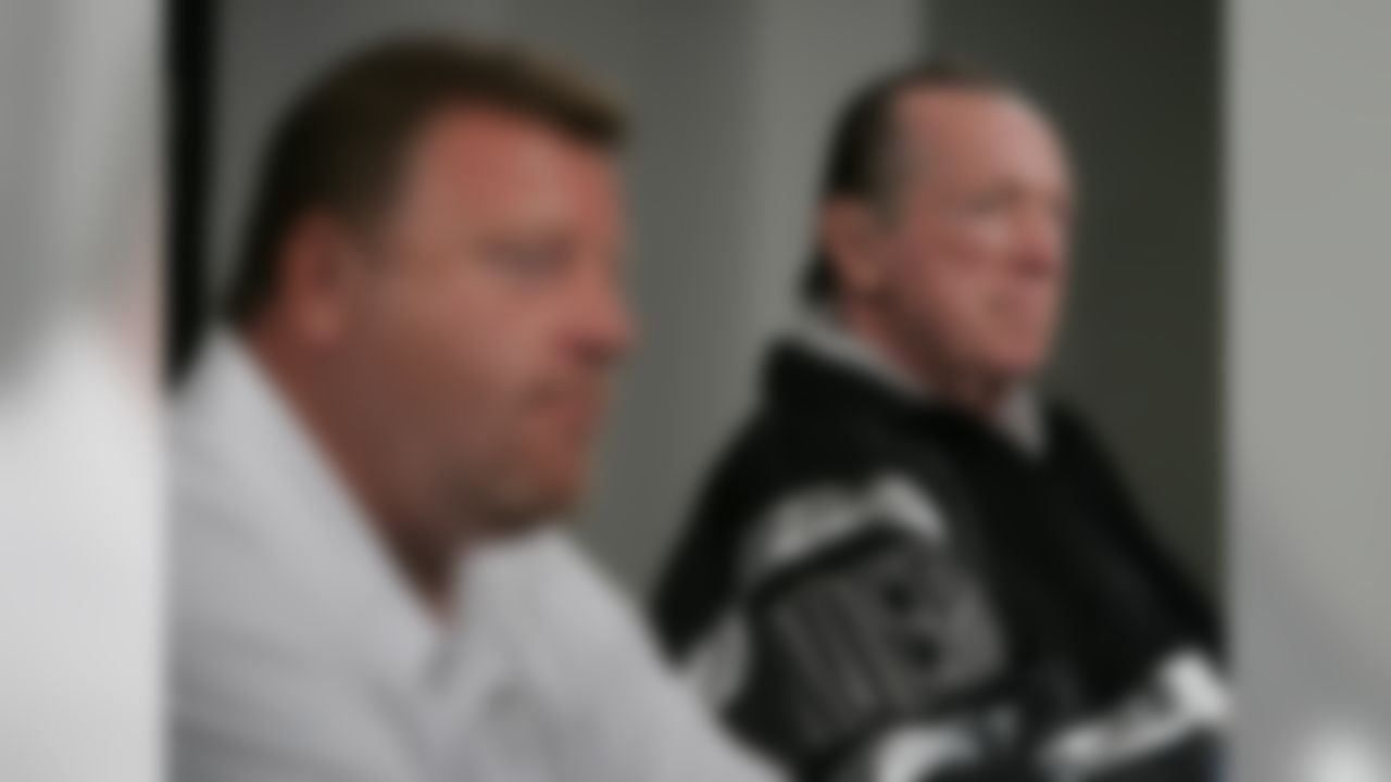 Oakland Raiders owner Al Davis, right, and new interim head coach Tom Cable listen during a news conference at Raiders headquarters in Alameda, Calif., Tuesday, Sept. 30, 2008. The Raiders fired head football coach Lane Kiffin on Tuesday, Sept. 30, 2008, just four games into his second season, bringing finality to a situation that had been simmering for eight months. (AP Photo/Paul Sakuma)