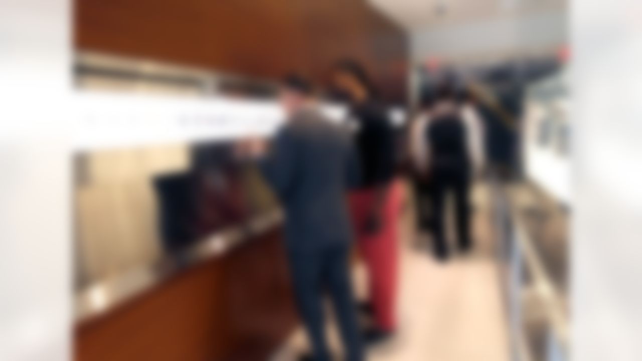 Johnny Manziel and Jadeveon Clowney look at displays at the NFL headquarters on May 7, 2014 in New York, NY. (Ben Liebenberg/NFL)