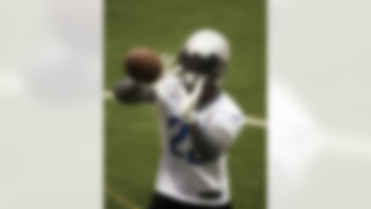 Detroit Lions cornerback Chris Houston makes a catch during football drills at the Detroit Lions training facility in Allen Park, Mich. Friday, July 27, 2012. (AP Photo/Carlos Osorio)