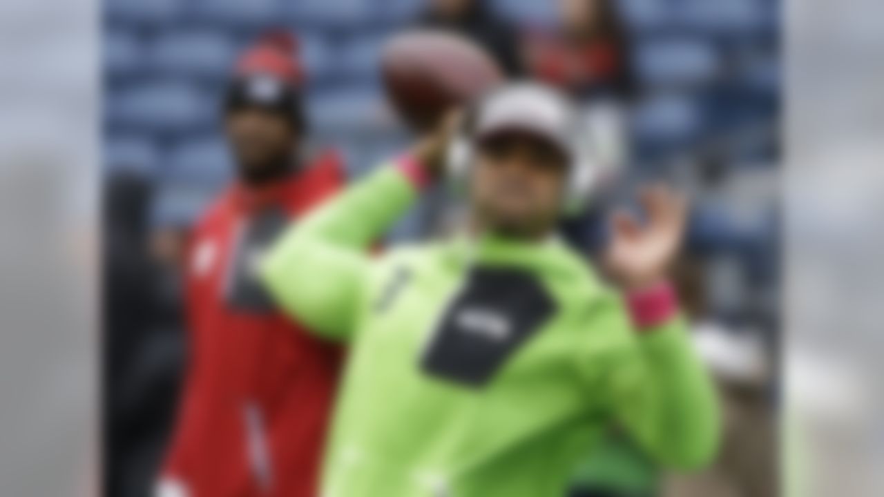 Seattle Seahawks quarterback Russell Wilson passes during warmups before an NFL football game against the Atlanta Falcons, Sunday, Oct. 16, 2016, in Seattle. (AP Photo/Elaine Thompson)