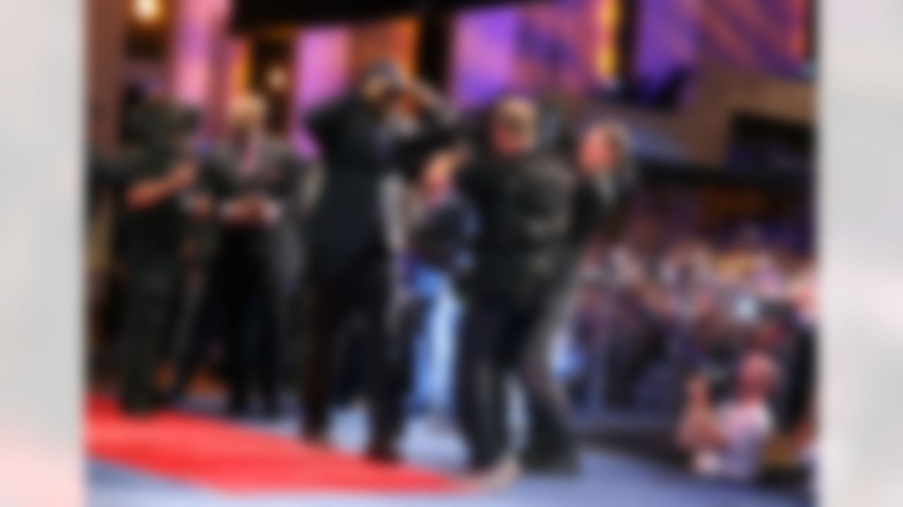 Jadeveon Clowney walks on stage after being selected by the Houston Texans during the 2014 NFL Draft at Radio City Music Hall on May 8, 2014 in New York, NY. (Ben Liebenberg/NFL)