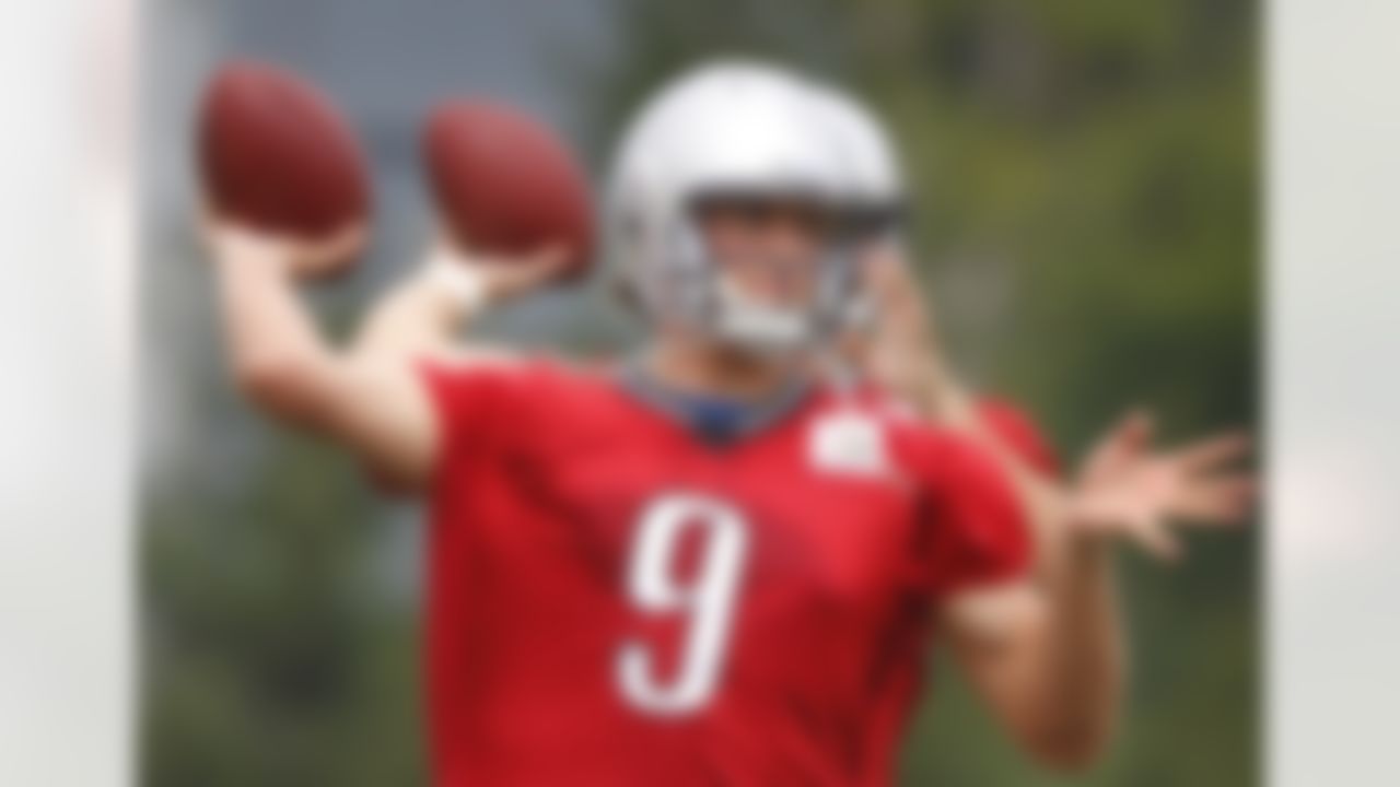 Detroit Lions quarterback Matthew Stafford (9) practices with teammate Drew Stanton during NFL football camp at their training facility in Allen Park, Mich., Monday, Aug. 2, 2010. Stafford is the undisputed starting quarterback for the Lions, unlike this time a year ago when he was competing with Daunte Culpepper for the job. (AP Photo/Carlos Osorio)